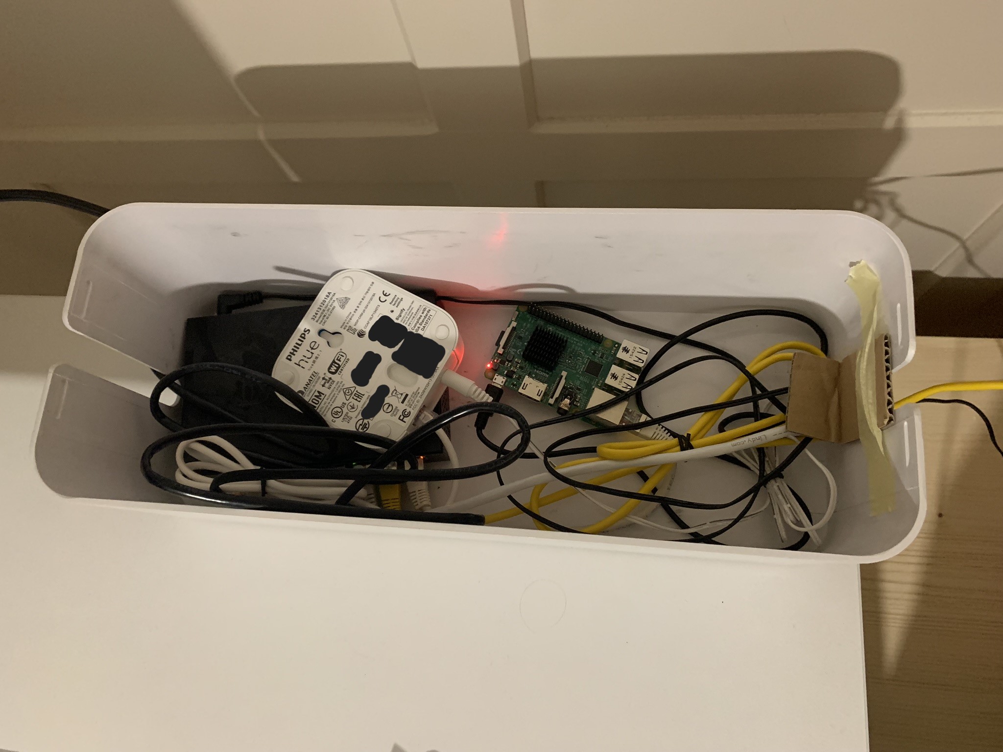 Raspberry Pi, Philips Hue Bridge, and a Switch inside a box